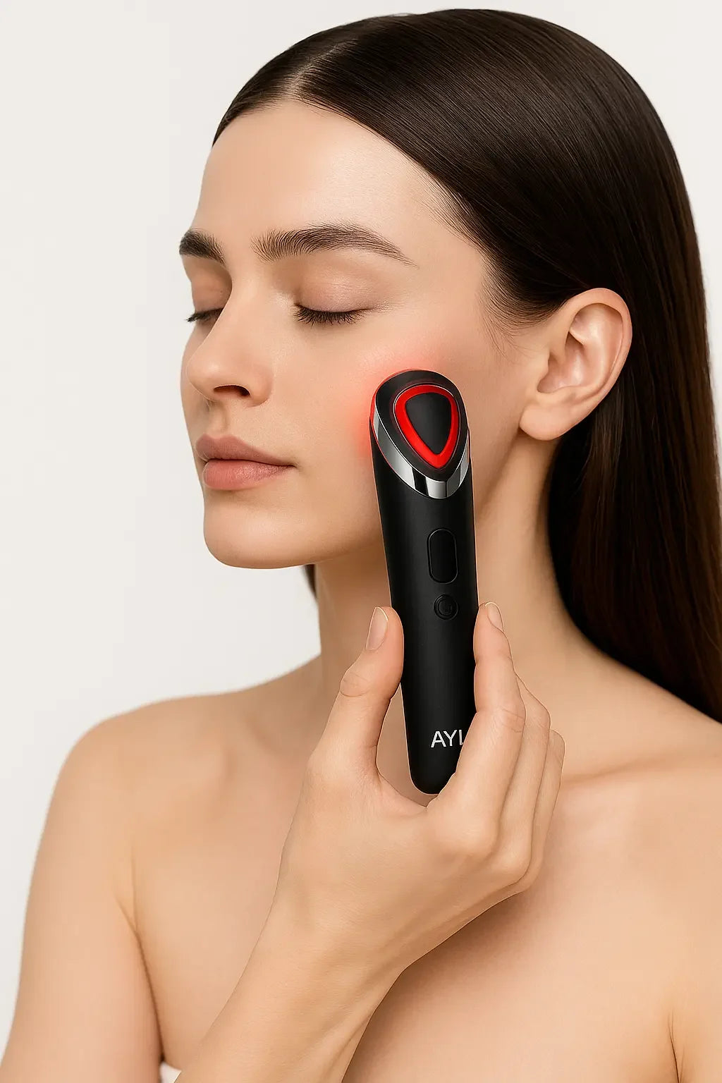 Appareil de massage visage AYLI Booster Facial 7 en 1, soin anti-âge avec chaleur et lumière rouge pour lifter, raffermir et réduire rides et ridules.